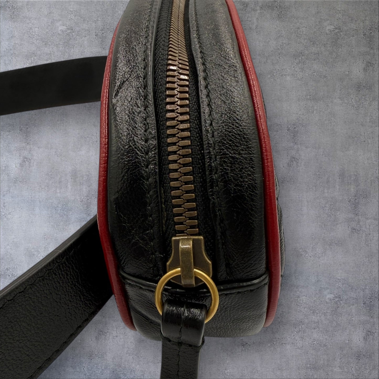 340. Gucci GG Black Calfskin Marmont Matelasse Leather Belt Bag with red trim