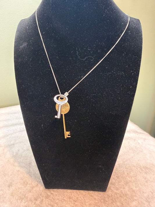1240. Louis Vuitton LV Gold/Silver Key necklace