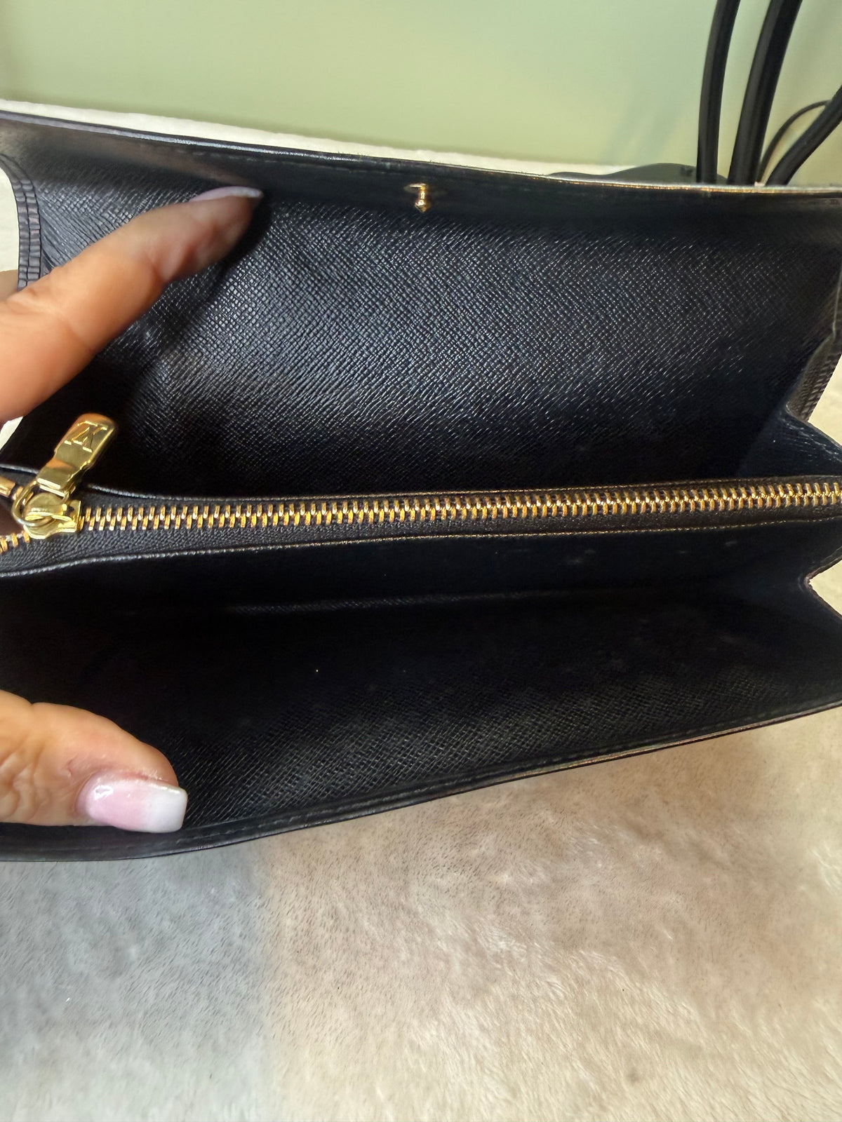 2102. Louis Vuitton Black Epi Sarah Wallet