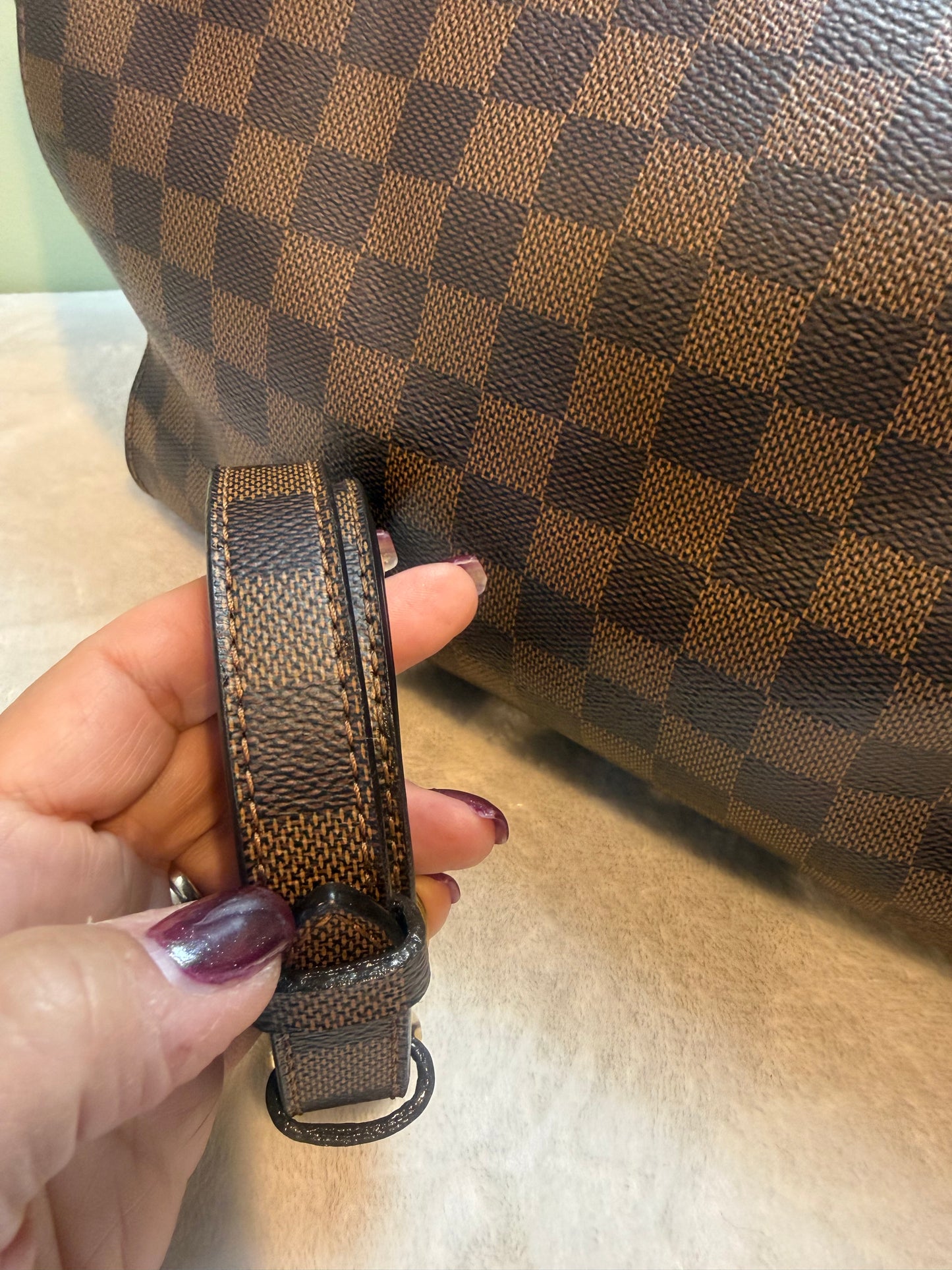 1875. Louis Vuitton Damier Ebene Greenwich PM Tote with Brown leather