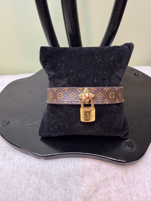 1575. Louis Vuitton Monogram Lock Charm Bracelet