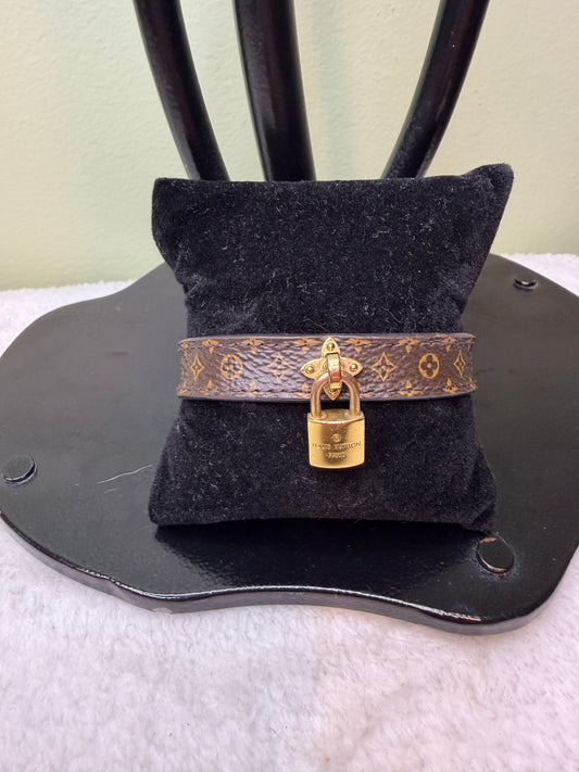 1575. Louis Vuitton Monogram Lock Charm Bracelet