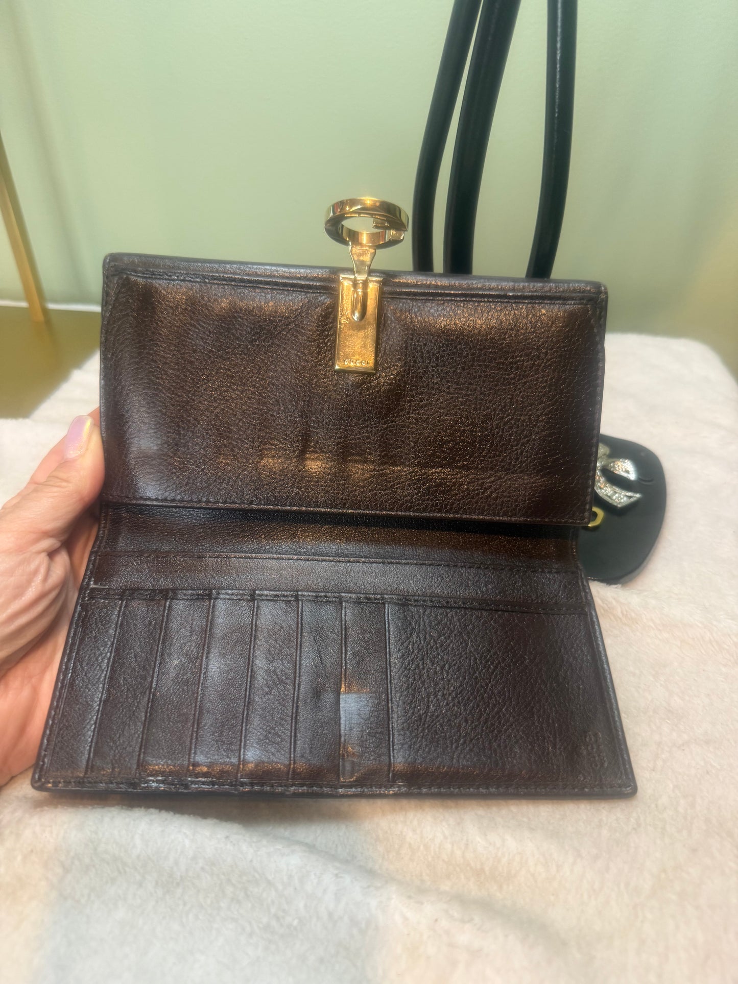 1151. Gucci GG Canvas Interlocking Continental Wallet
