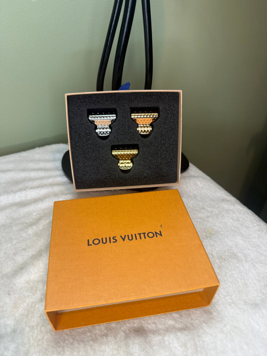 1250. Louis Vuitton Nanogram Set of 3 Hair clips