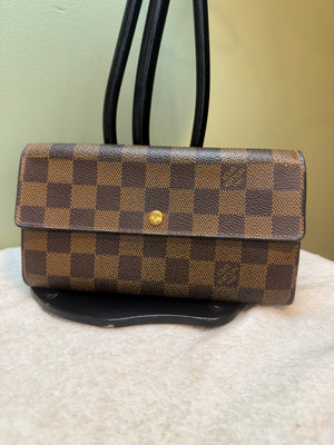 1680. Louis Vuitton Damier Ebene Sarah Wallet
