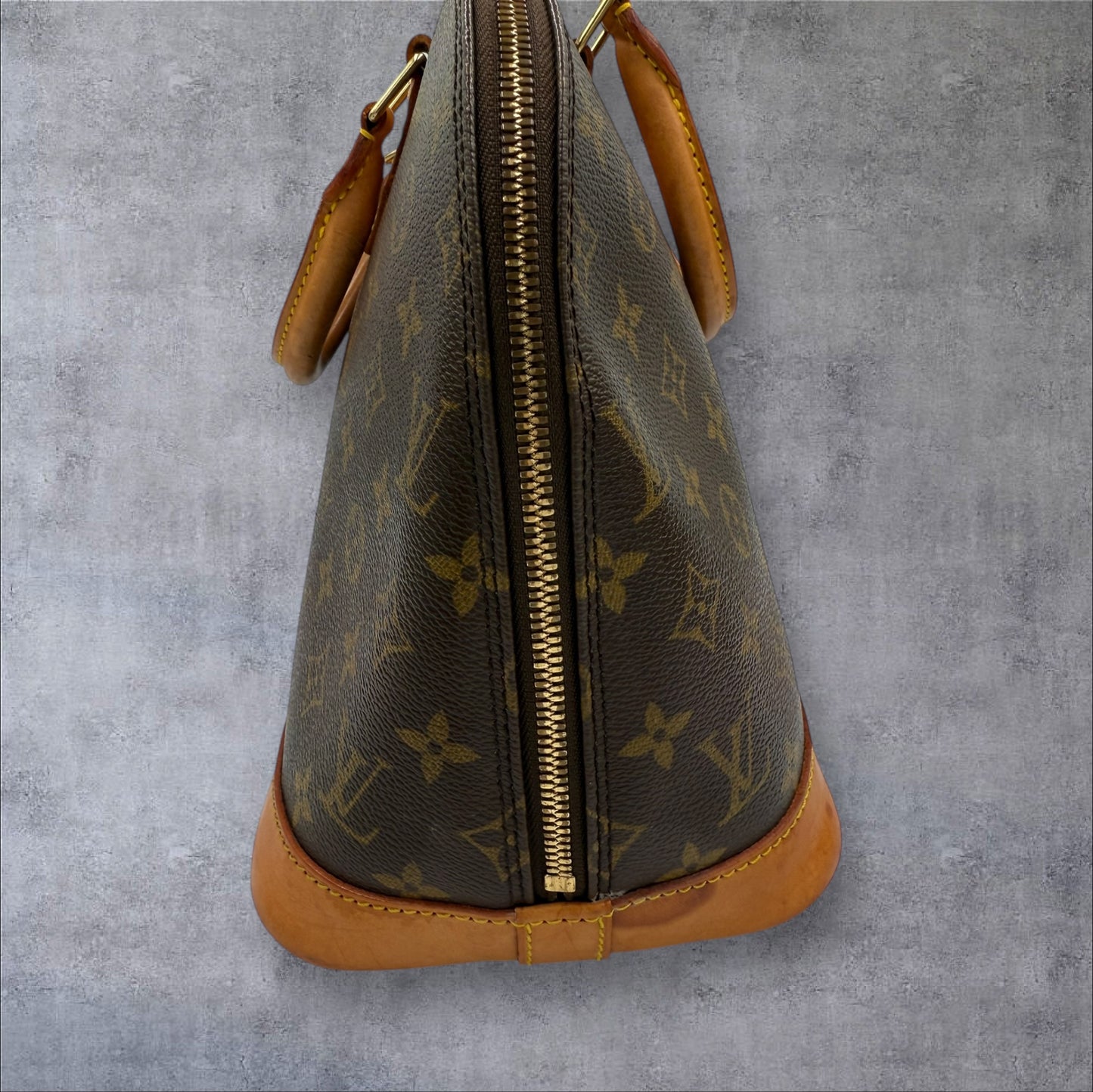 314. Louis Vuitton Monogram Alma PM