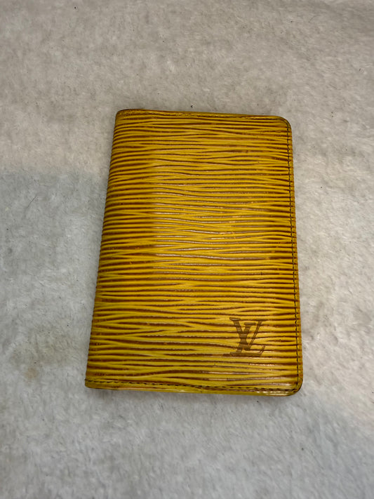 494. Louis Vuitton Yellow Epi pocket organizer with purple interior