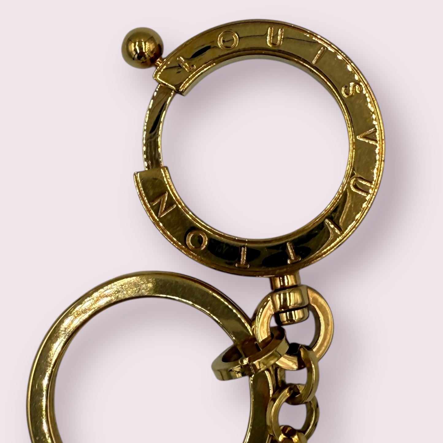 309. Louis Vuitton Gold Tassel Bag Charm