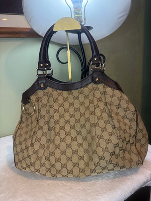 2169. Gucci GG Canvas Sukey Handbag