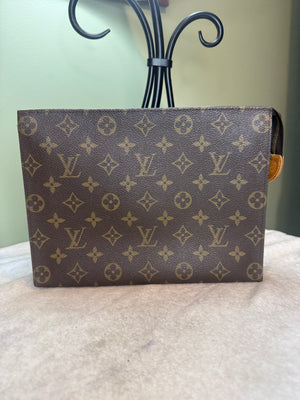 1453. Louis Vuitton Monogram Toiletry 26
