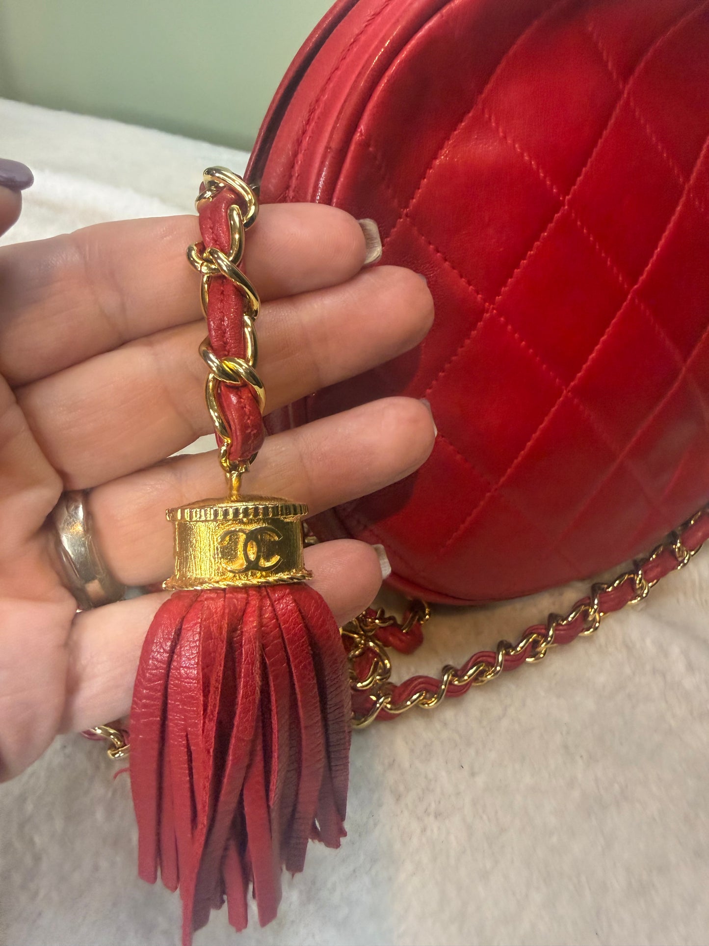 1051. Chanel Red Quilted Round Crossbody with Gold