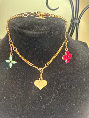 1315. Louis Vuitton Sweet Monogram Bracelet with enamel charms